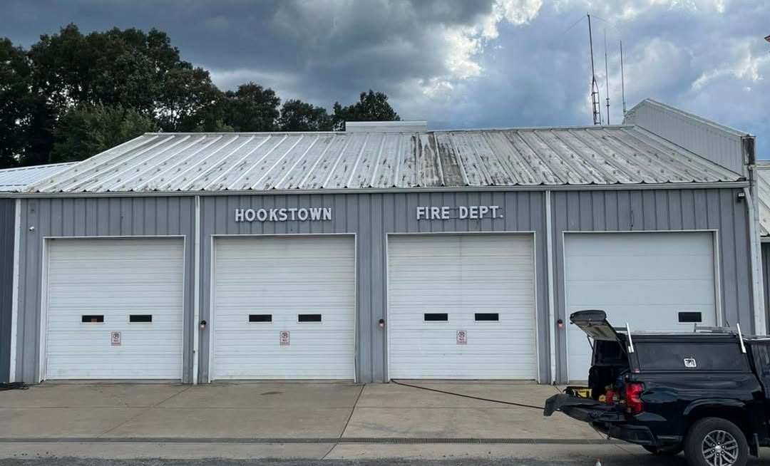Hookstown Fire Department metal roof before coating, stained and weathered
